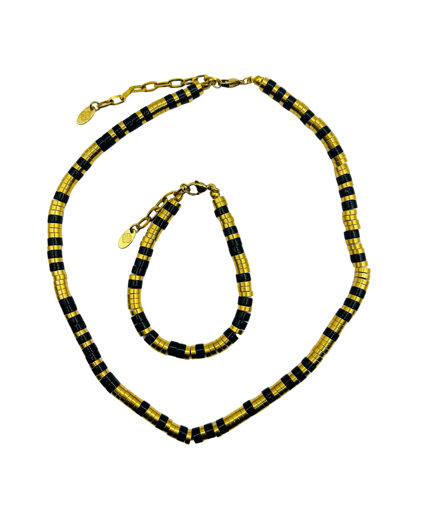 Female Eona Black Set gold and black beaded necklace and bracelet flat lay on white background