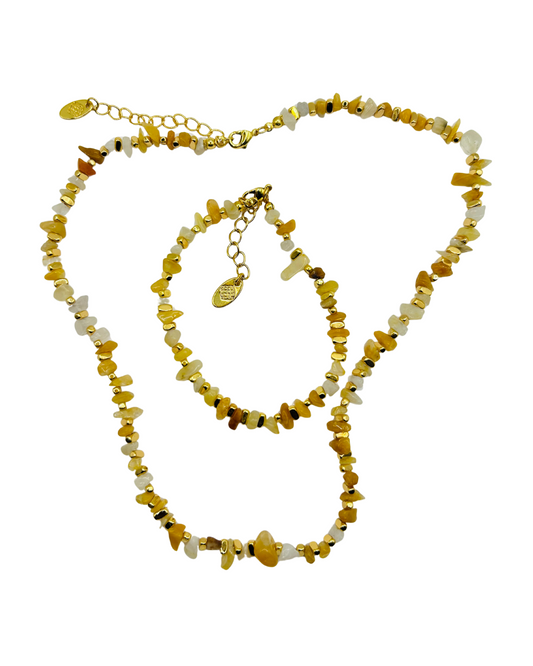 Set of beaded necklaces on a white background