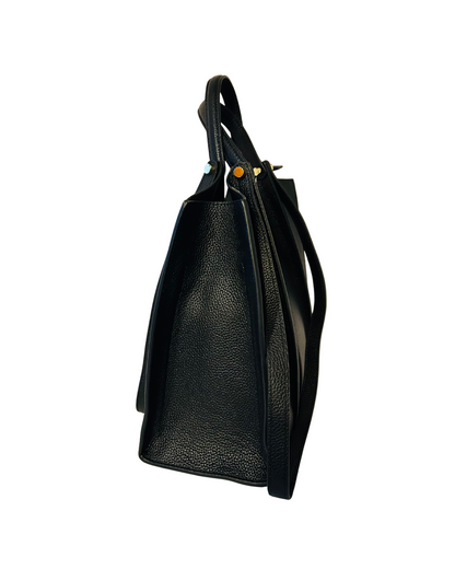 Black leather handbag with a strap on a white background