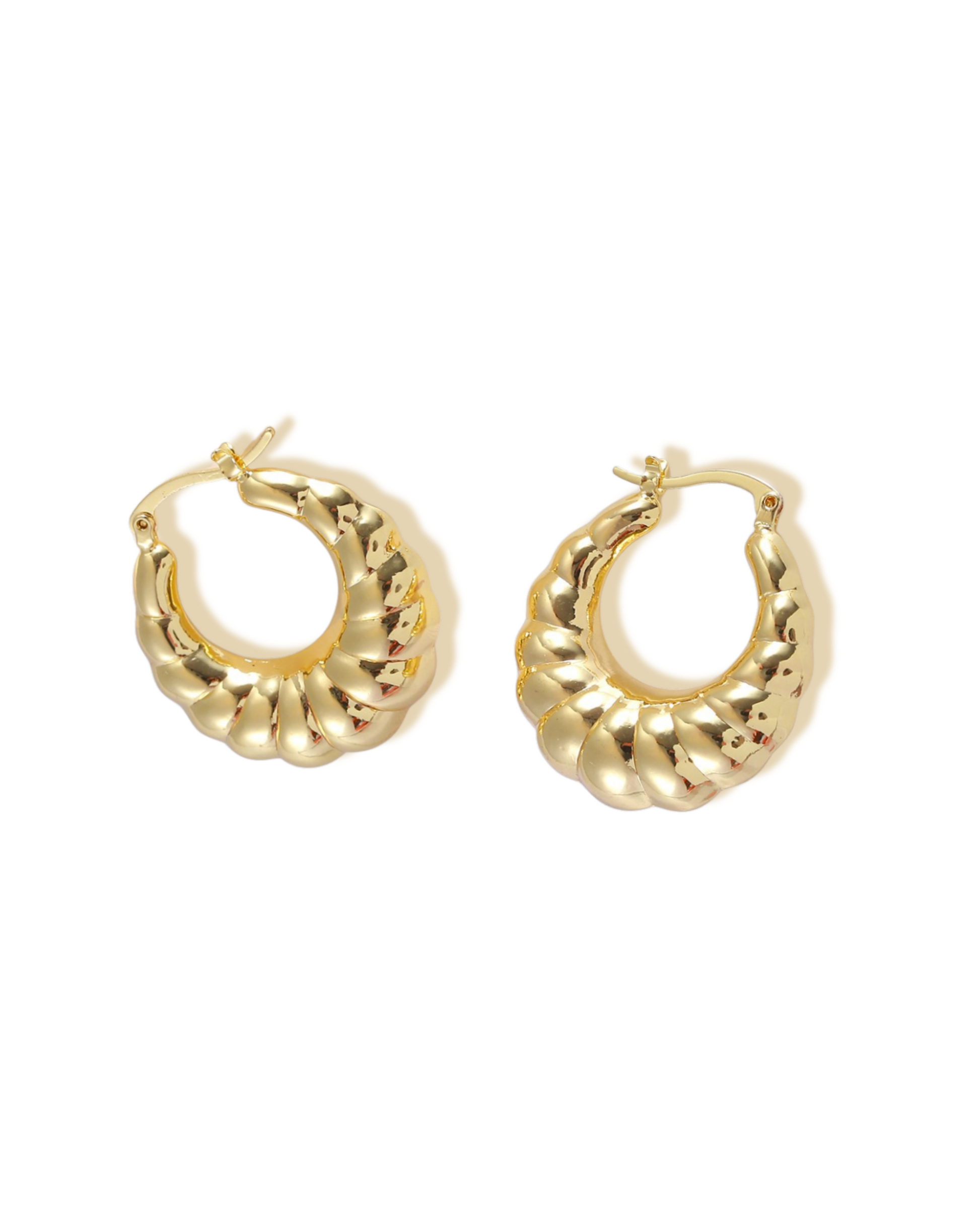 Cadence Earring Gold hoop earrings on a white background