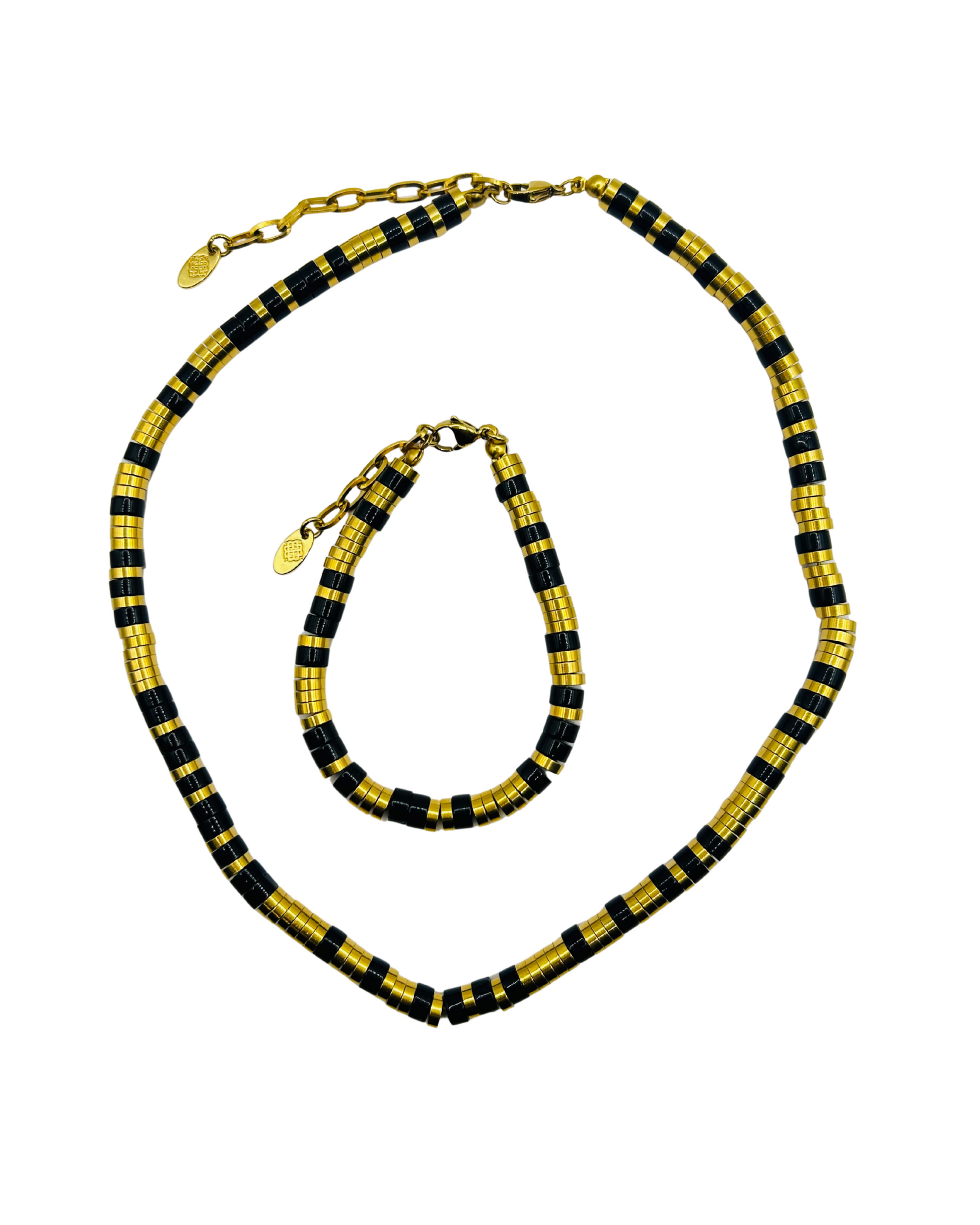 Black and gold beaded necklace and bracelet set on a white background