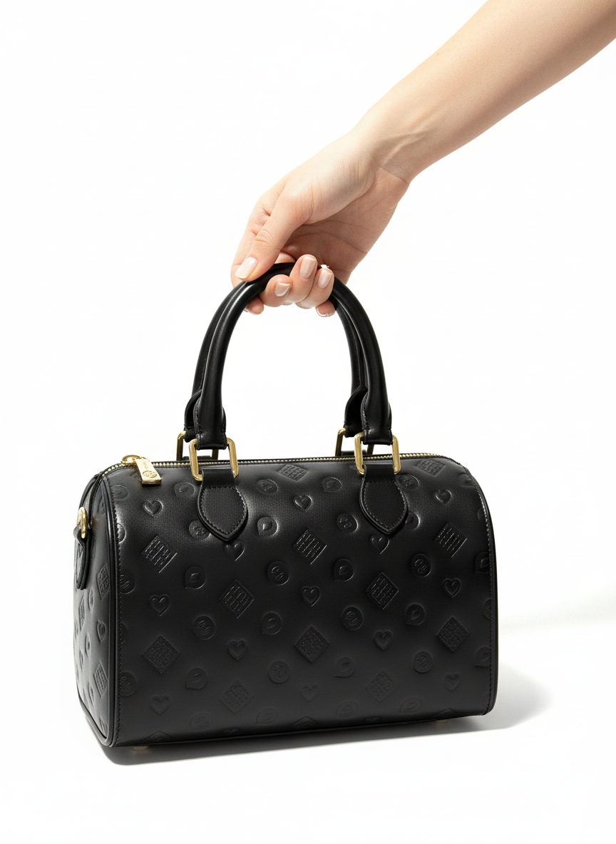 Female Black embossed structured handbag with gold hardware  front angle