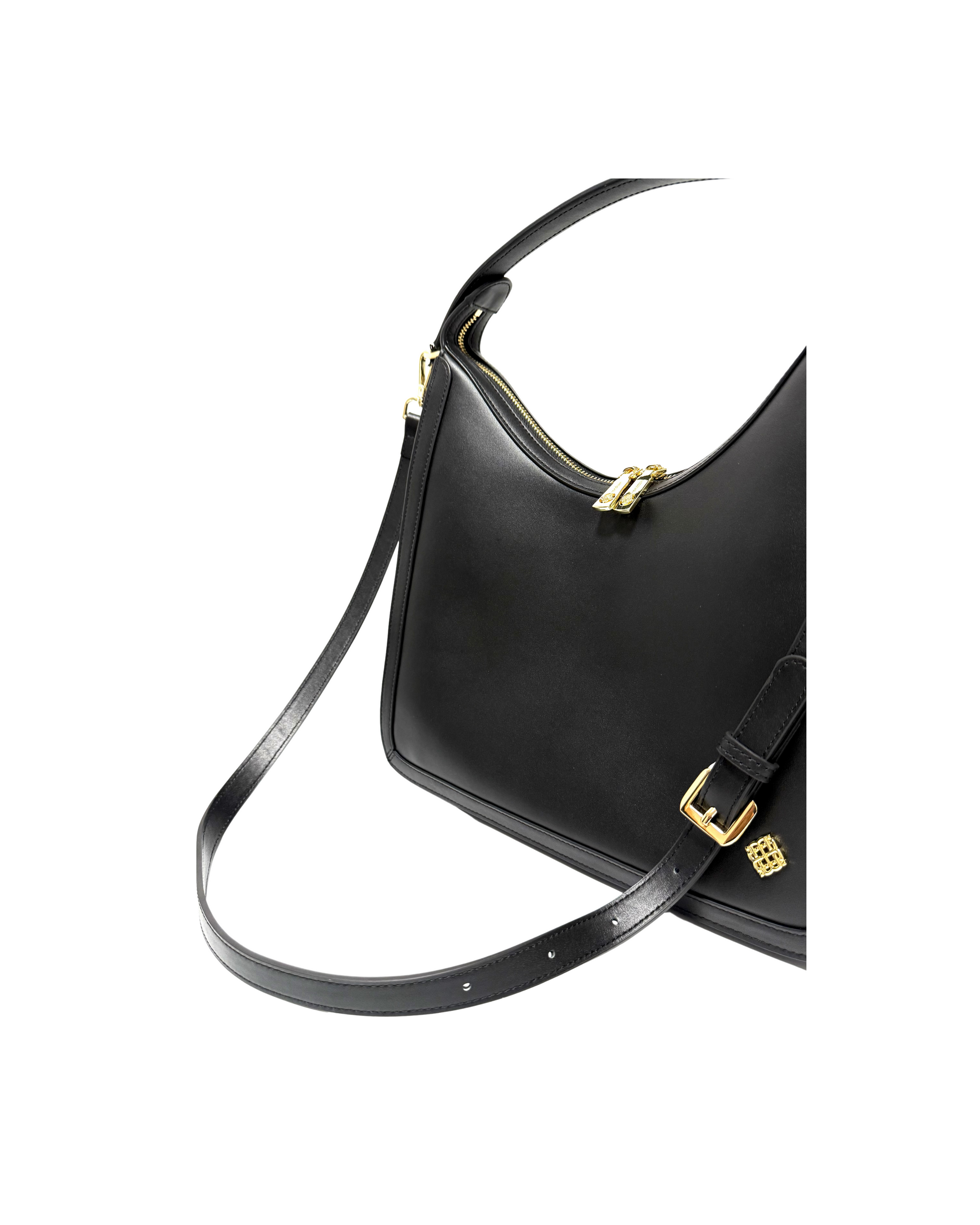 Black handbag with gold accents on a white background