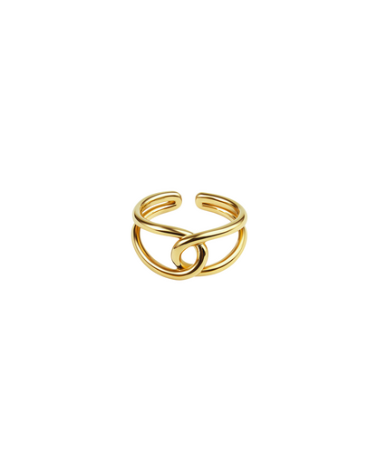 Gold open ring on a white background. Gold Bria Ring with open spiral design on white background.