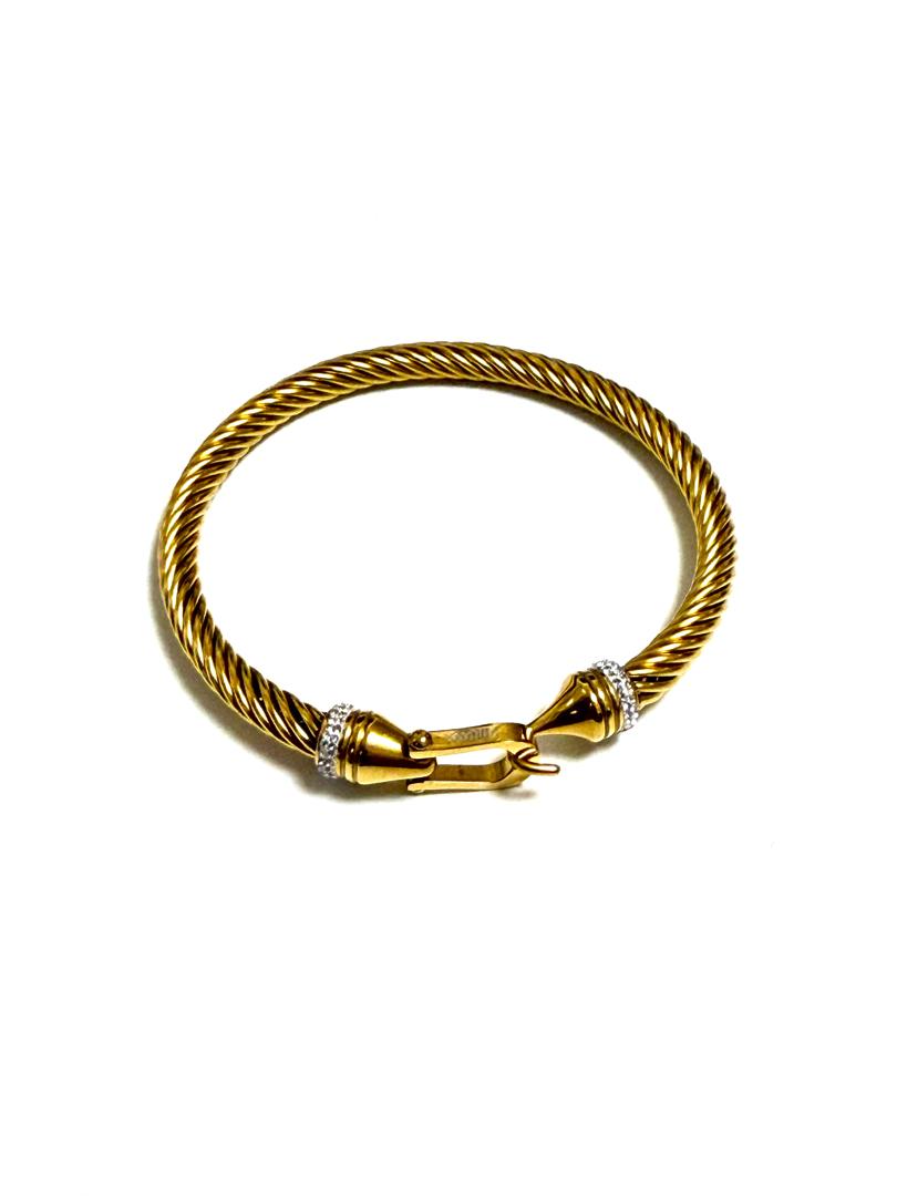 An 18k gold-plated classic cable cuff bangle bracelet with sparkling diamond accents and a fishhook clasp.