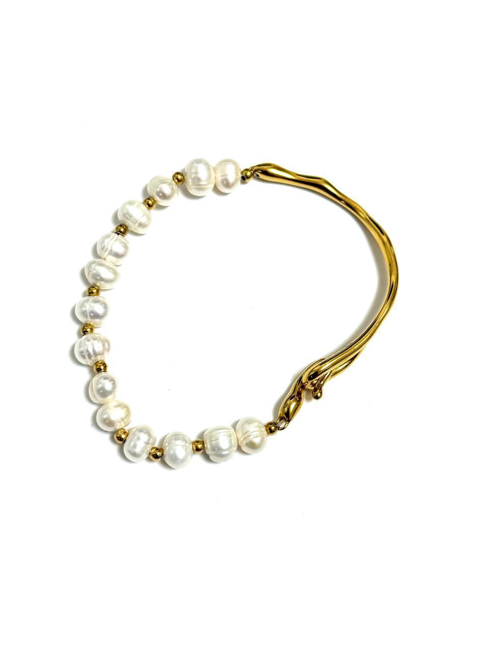 A white pearl bracelet with an 18k gold-plated band and a fishhook clasp.