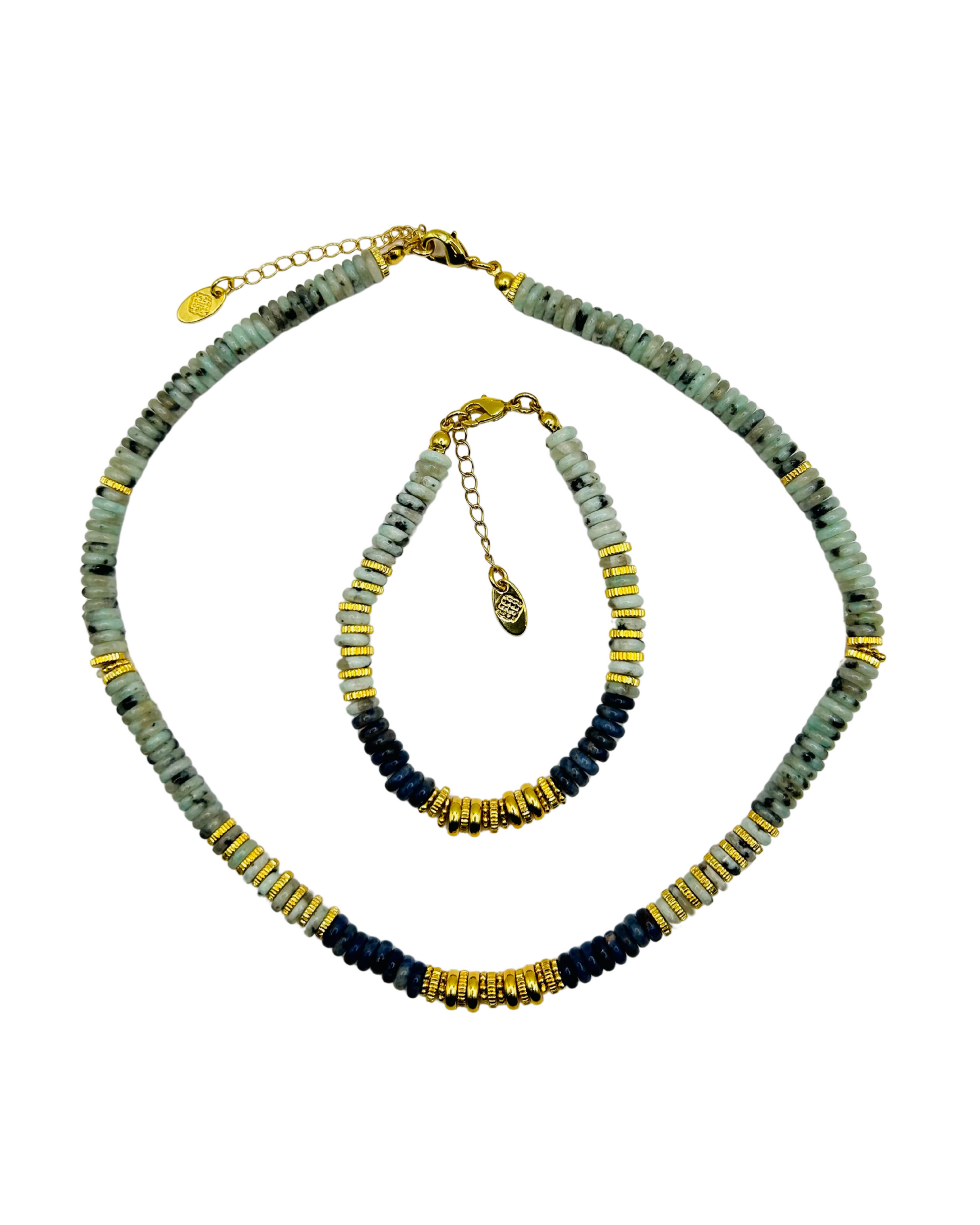 Set of two beaded necklaces with gold accents on a white background. Close-up of Indigo Set Necklace Showing Gold Spacer Beads and Gradient Colors