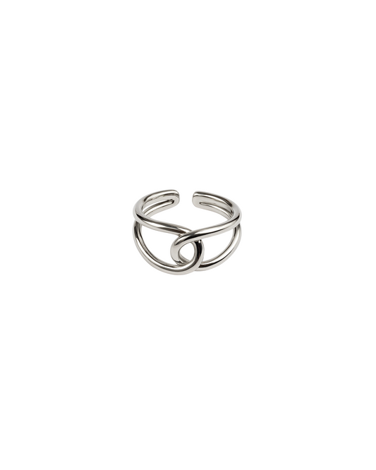Silver ring with a unique design on a white background