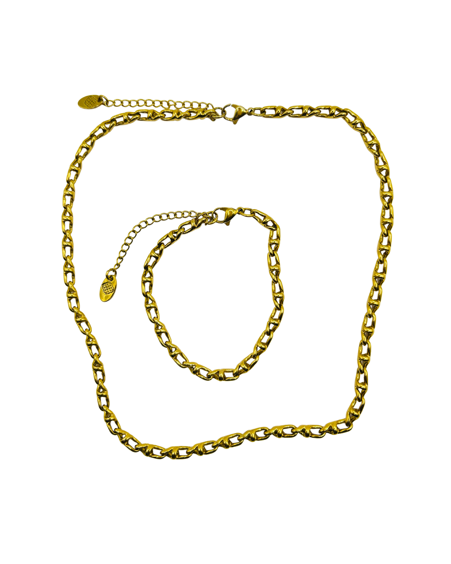 Gold chain necklace and bracelet on a white background