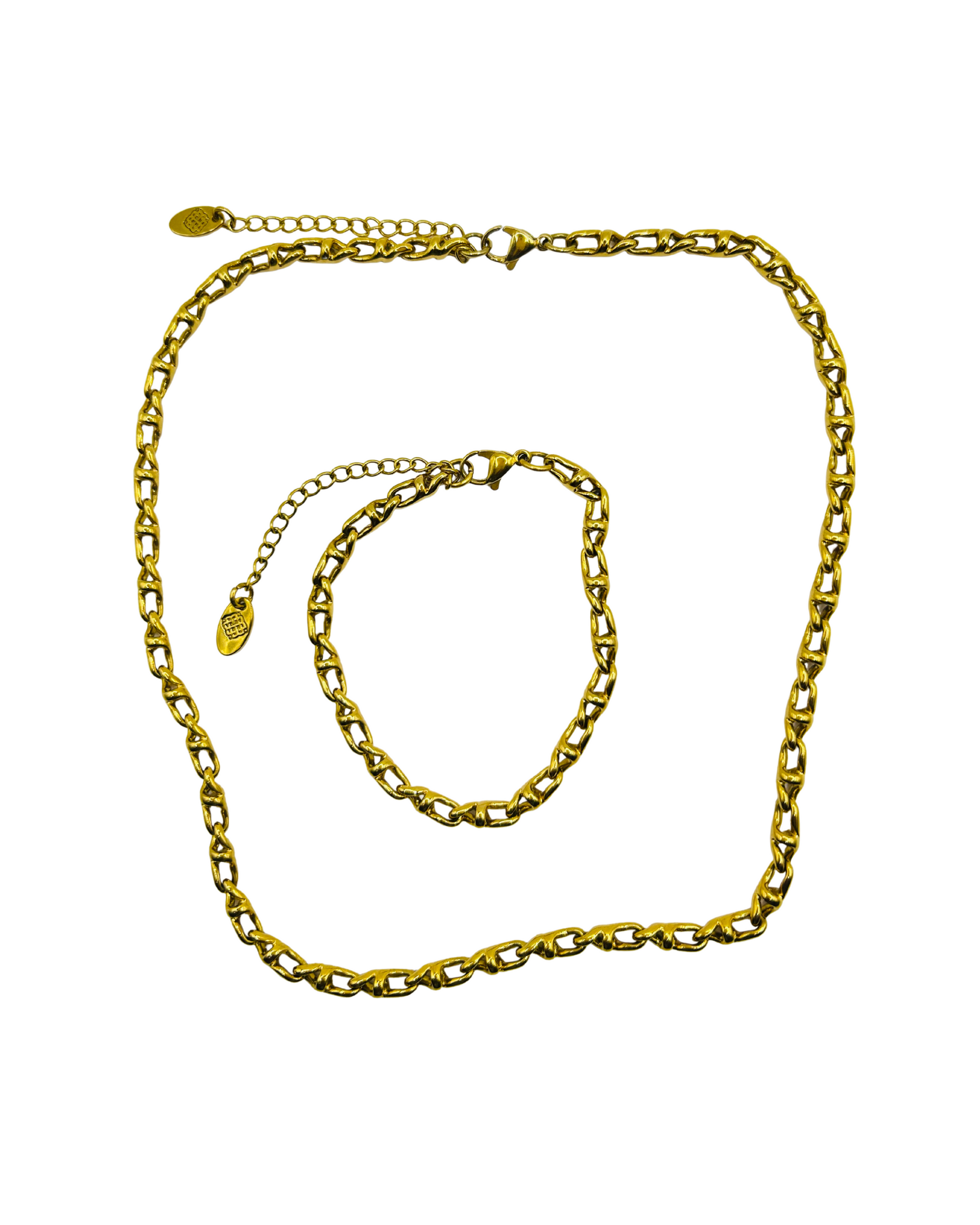 Gold chain necklace and bracelet on a white background